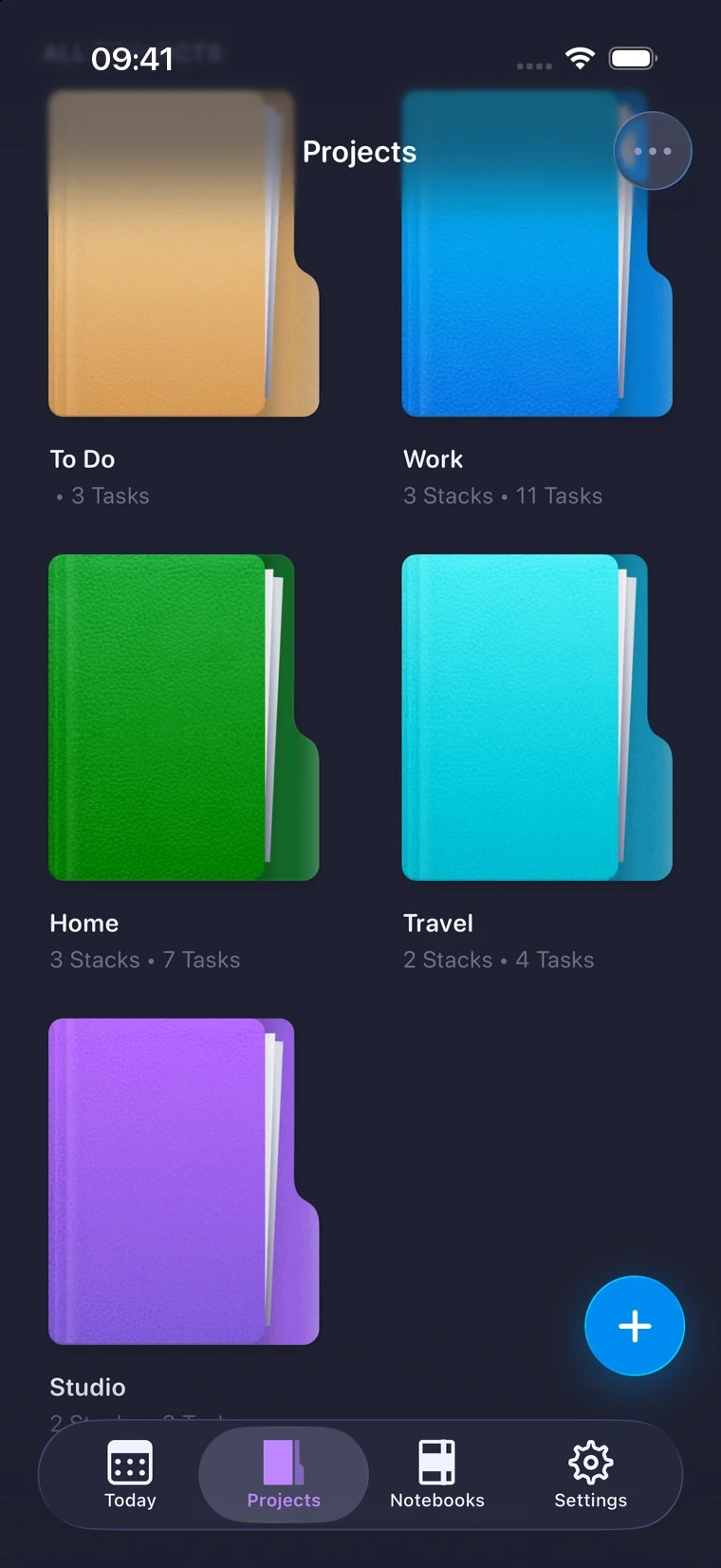 The Projects library in dark mode, showing a grid of coloured Project folders.